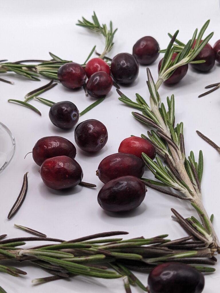 Cranberries and rosemary sprigs