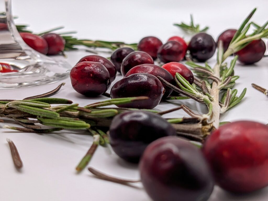 Cranberries and rosemary sprigs