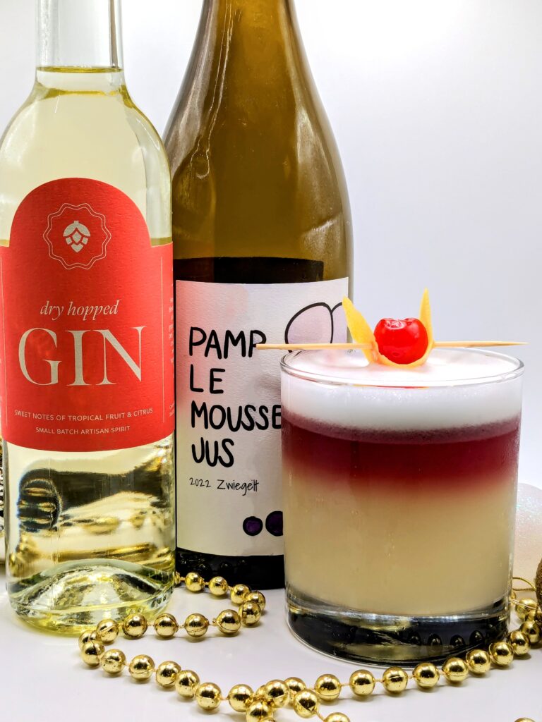 Dry Hopped Gin and Pamplemousse Jus Zweigelt wine used to make a sour cocktail