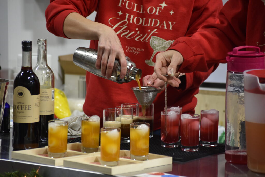 Preparing the cocktail flights at Controlled Entropy's Light Up the Vines Event