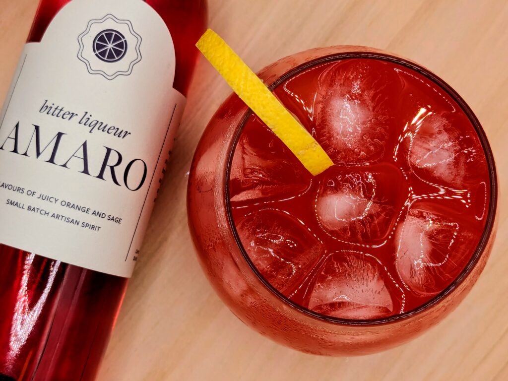 The Lemon Amaro Spritz Cocktail made with Controlled Entropy Distilling Amaro