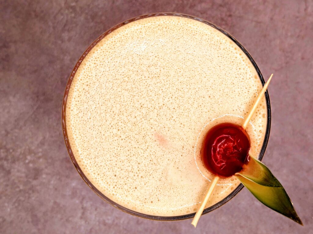 Piñarita - a bold, tropical margarita-style cocktail blending smoky jalapeño heat, sweet pineapple, and zesty lime for playful, spicy sipping